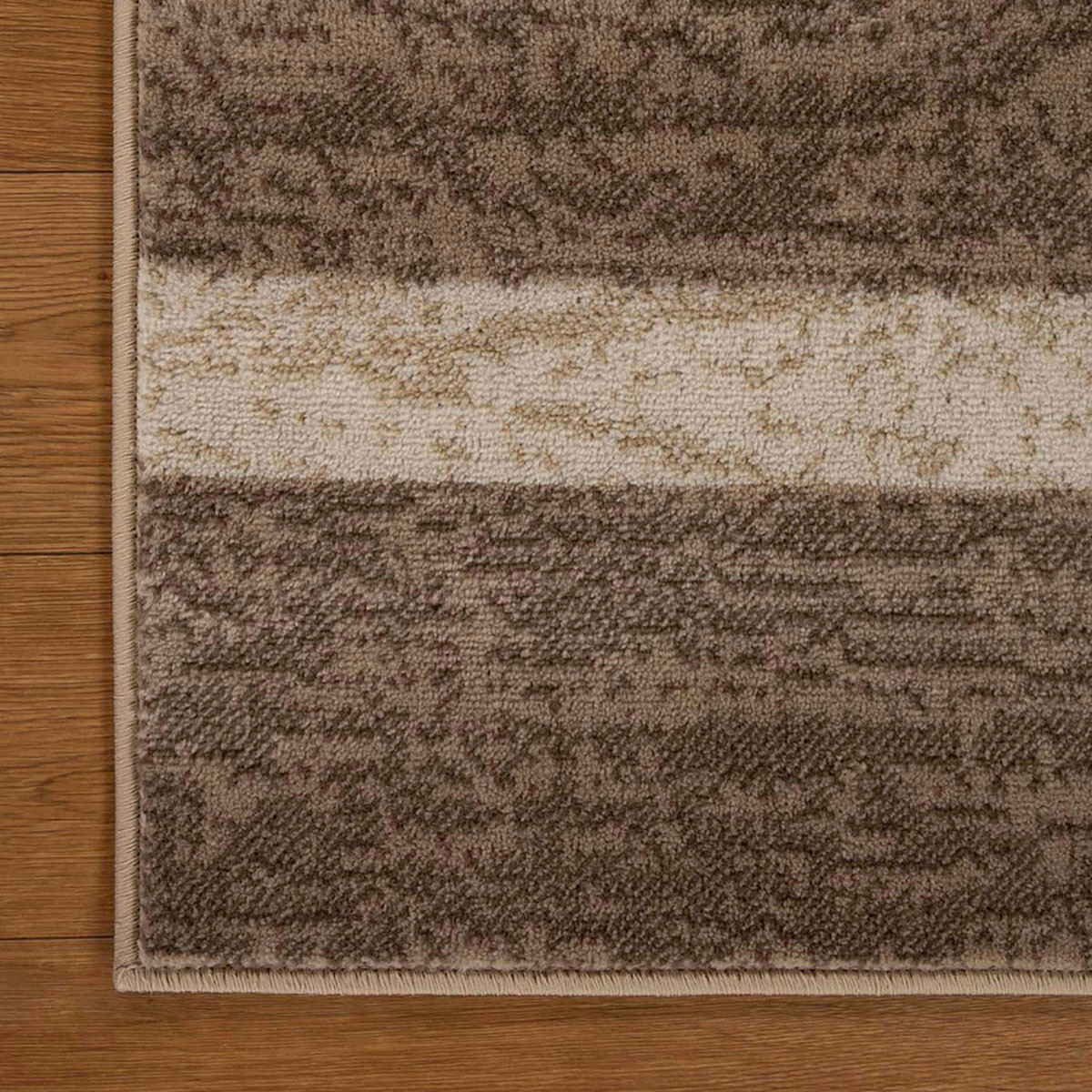 7" X 9" Beige Patchwork Power Loom Stain Resistant Area Rug
