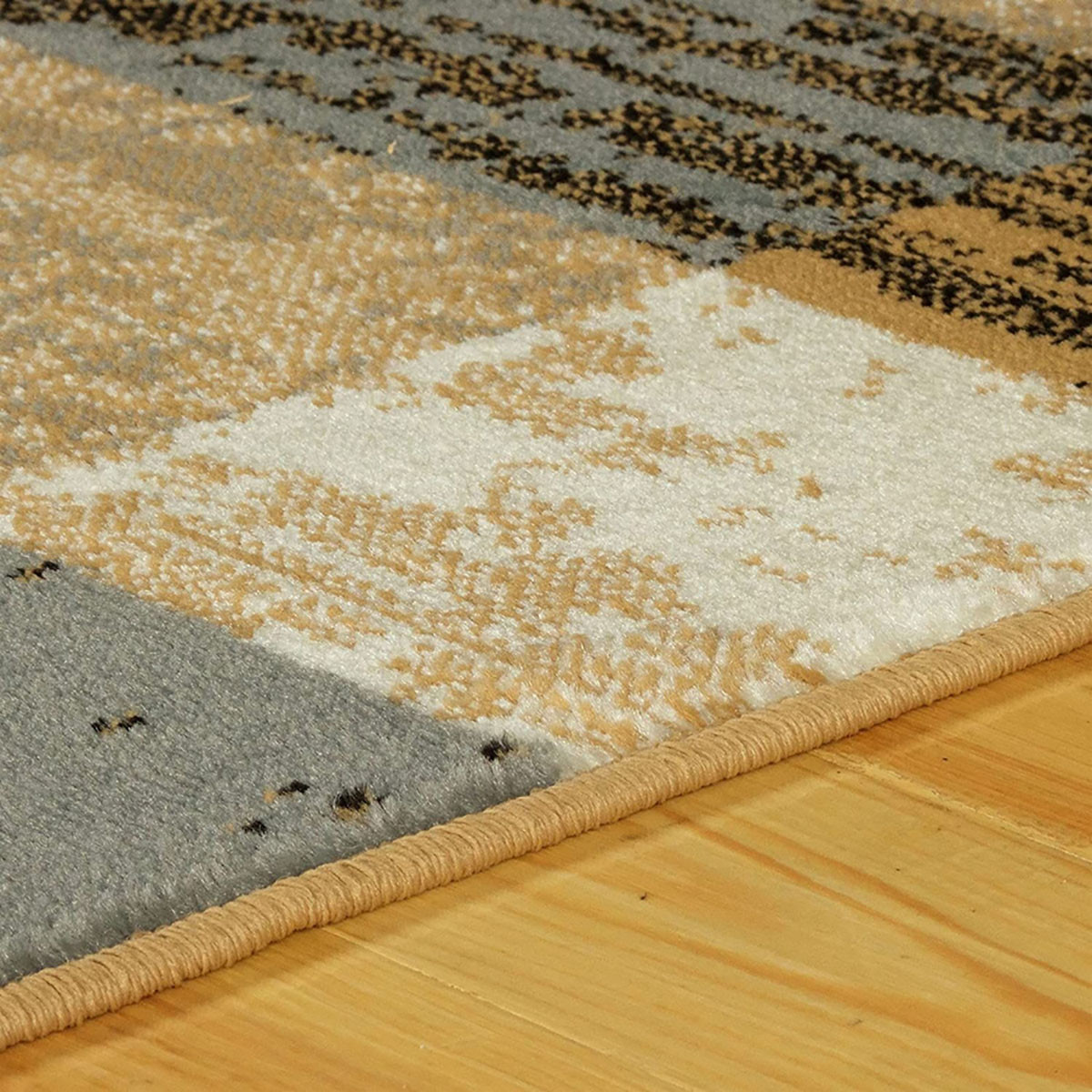 8" X 10" Light Blue And Beige Patchwork Power Loom Stain Resistant Area Rug