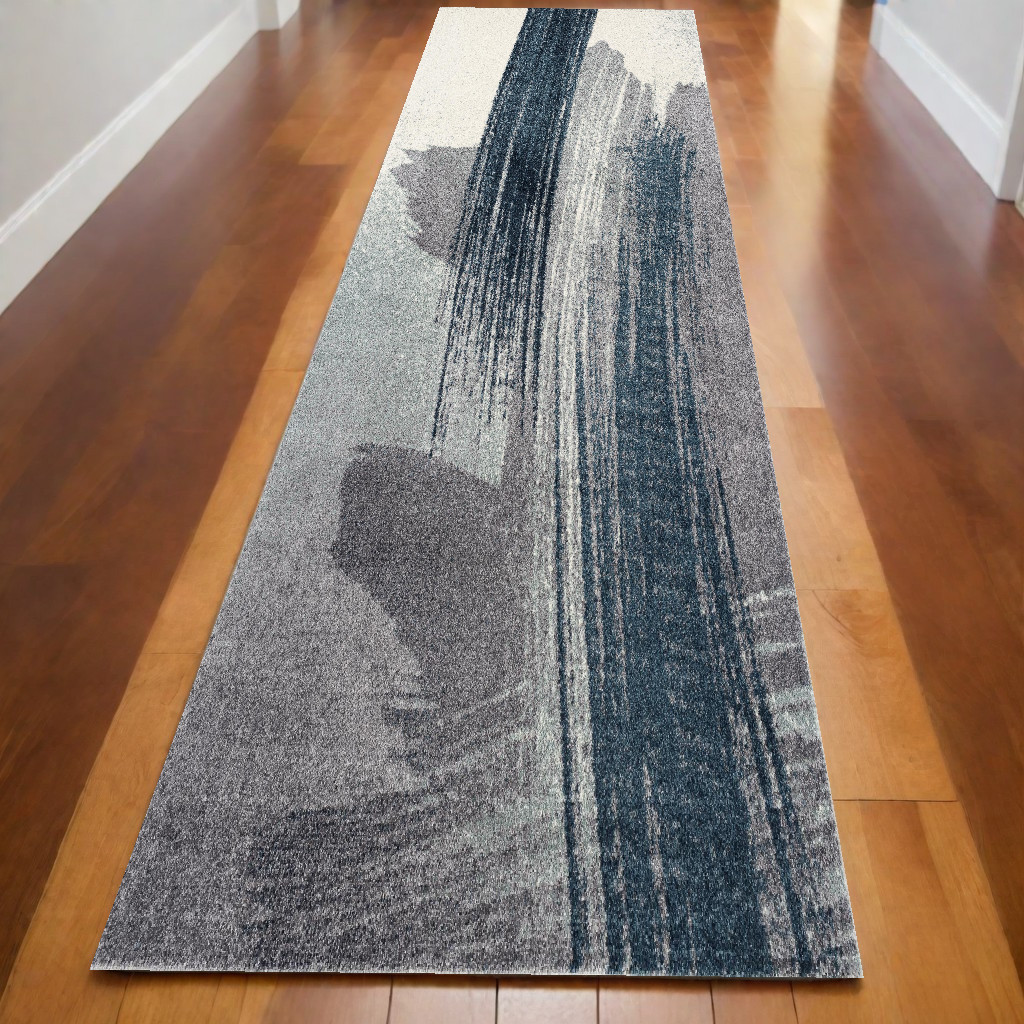 2" X 10" White And Blue Abstract Power Loom Stain Resistant Area Rug