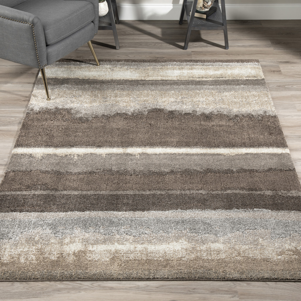 5" X 8" Brown and Ivory Abstract Area Rug
