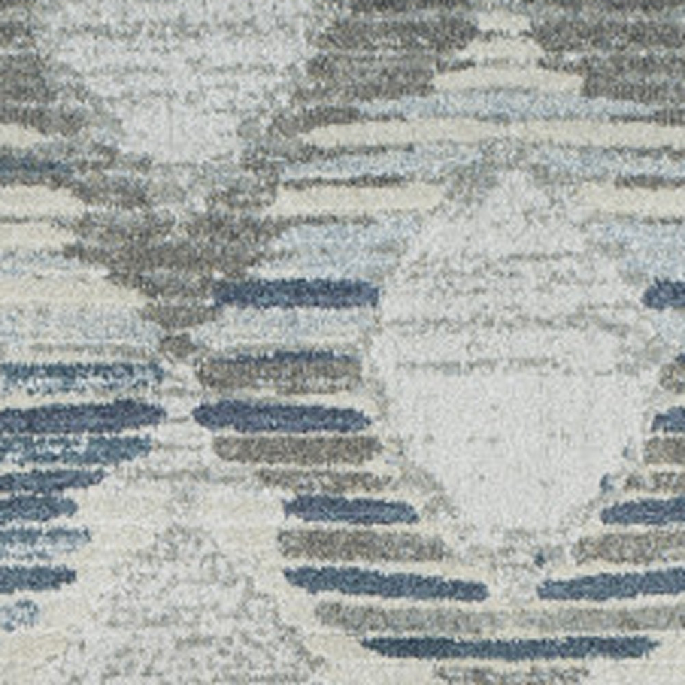 5" X 8" Blue and Ivory Geometric Area Rug