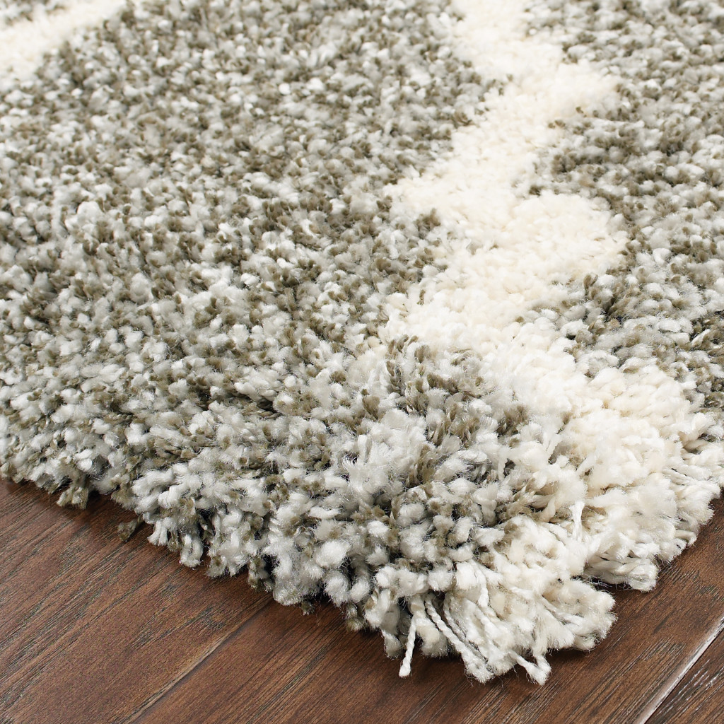 2" X 3" Grey And Ivory Geometric Shag Power Loom Stain Resistant Area Rug