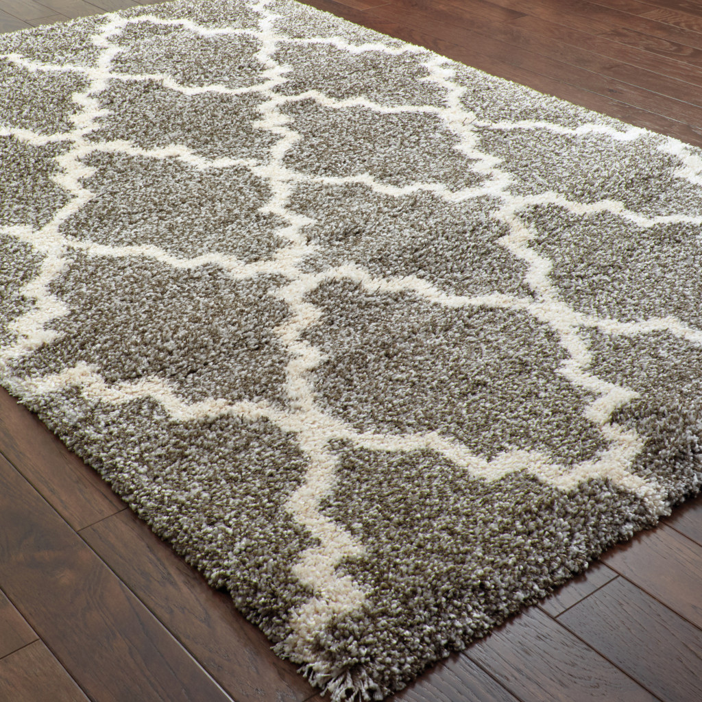 2" X 3" Grey And Ivory Geometric Shag Power Loom Stain Resistant Area Rug