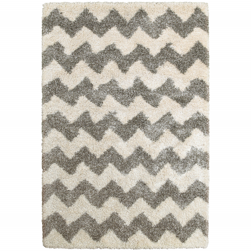 2" X 3" Grey And Ivory Geometric Shag Power Loom Stain Resistant Area Rug