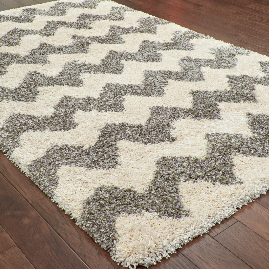2" X 3" Grey And Ivory Geometric Shag Power Loom Stain Resistant Area Rug