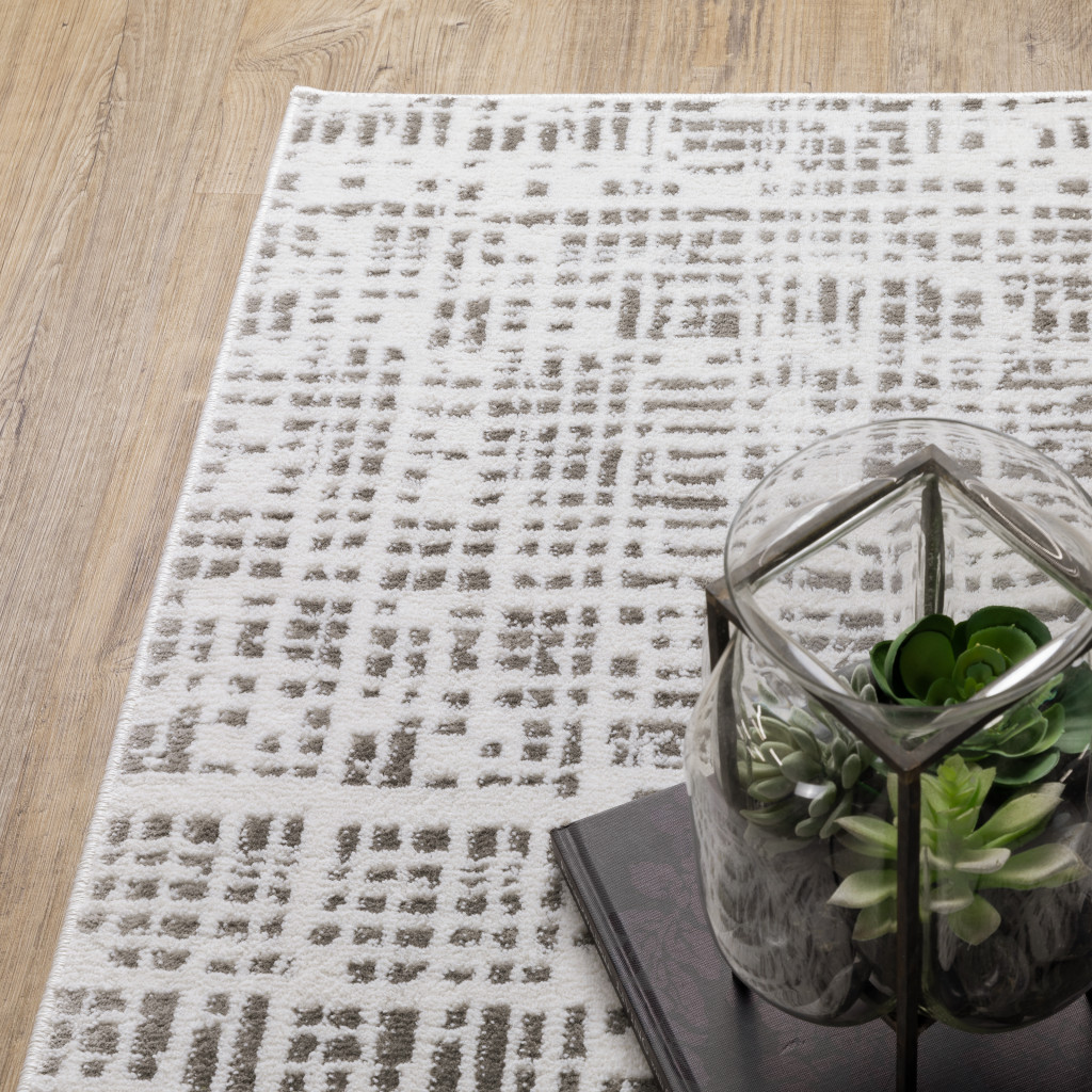 2" X 8" White And Grey Abstract Power Loom Stain Resistant Runner Rug