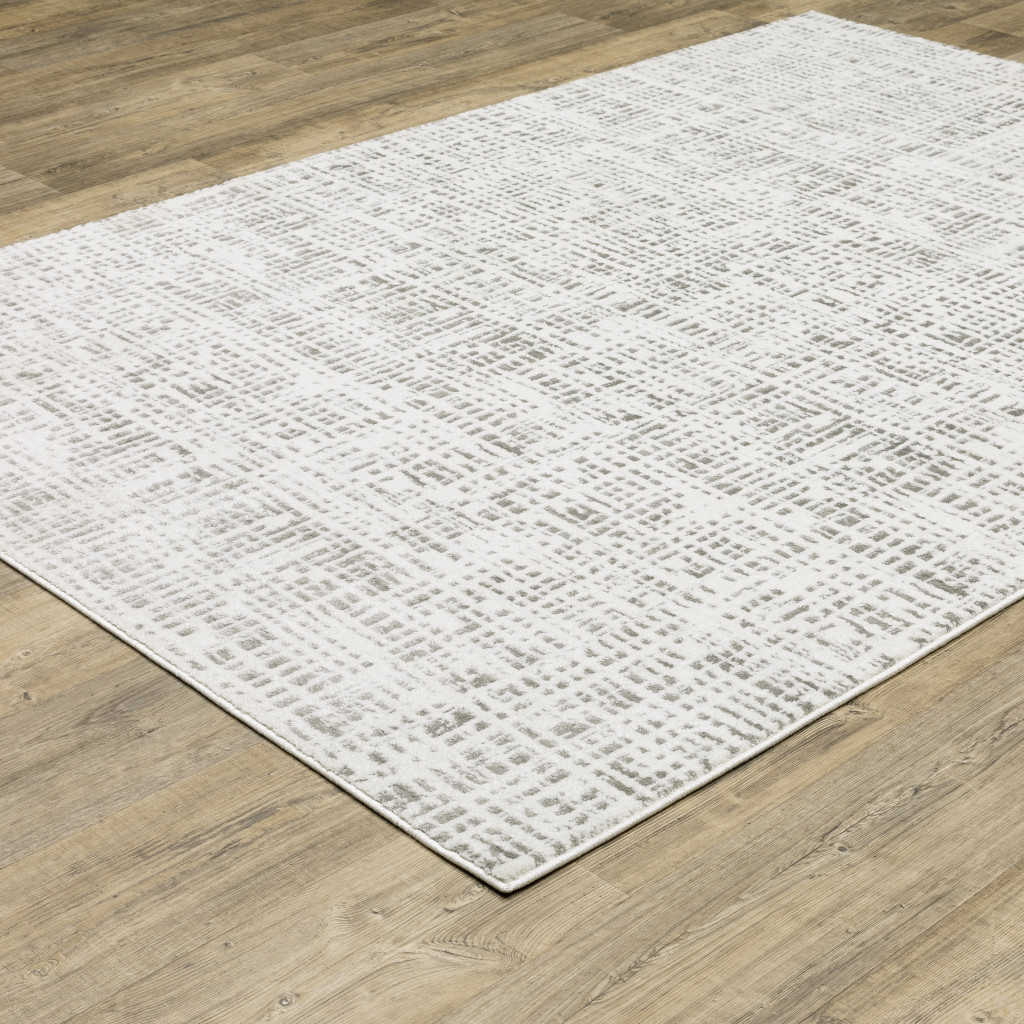 7" X 10" Gray and White Abstract Power Loom Area Rug