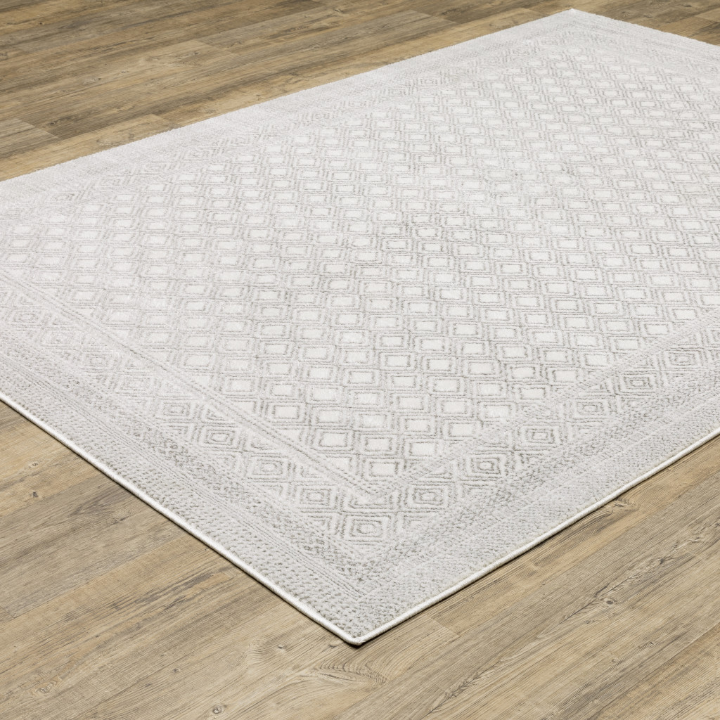 3" X 5" White And Grey Oriental Power Loom Stain Resistant Area Rug