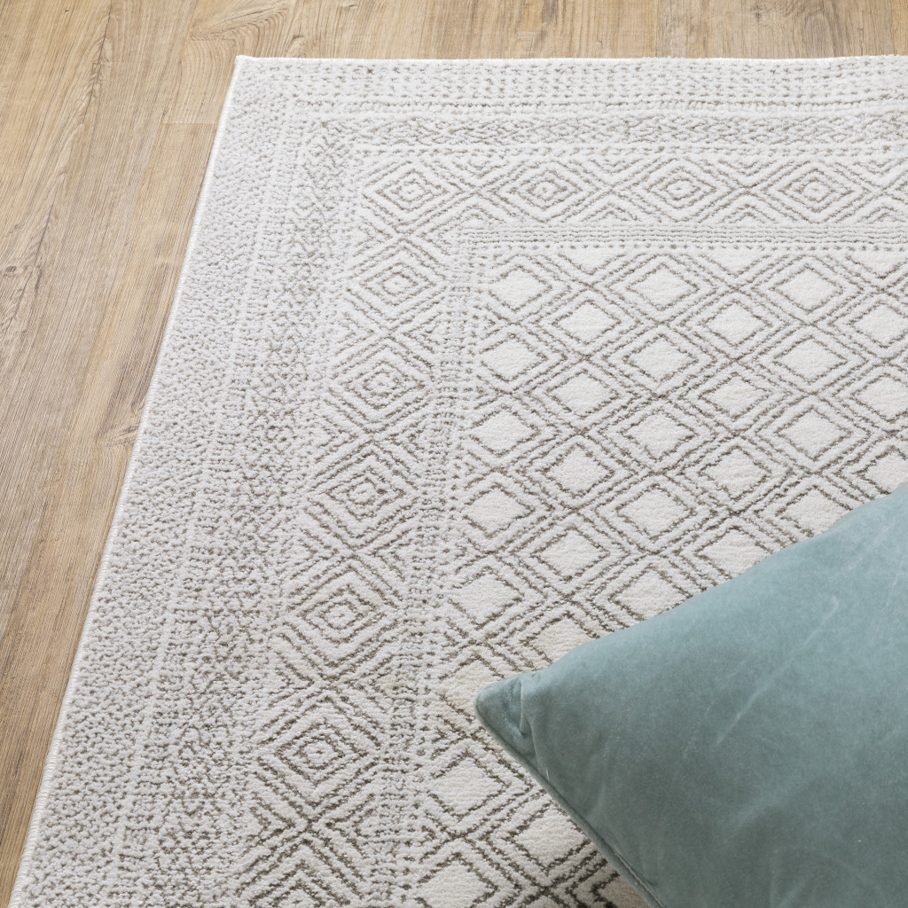 3" X 5" White And Grey Oriental Power Loom Stain Resistant Area Rug