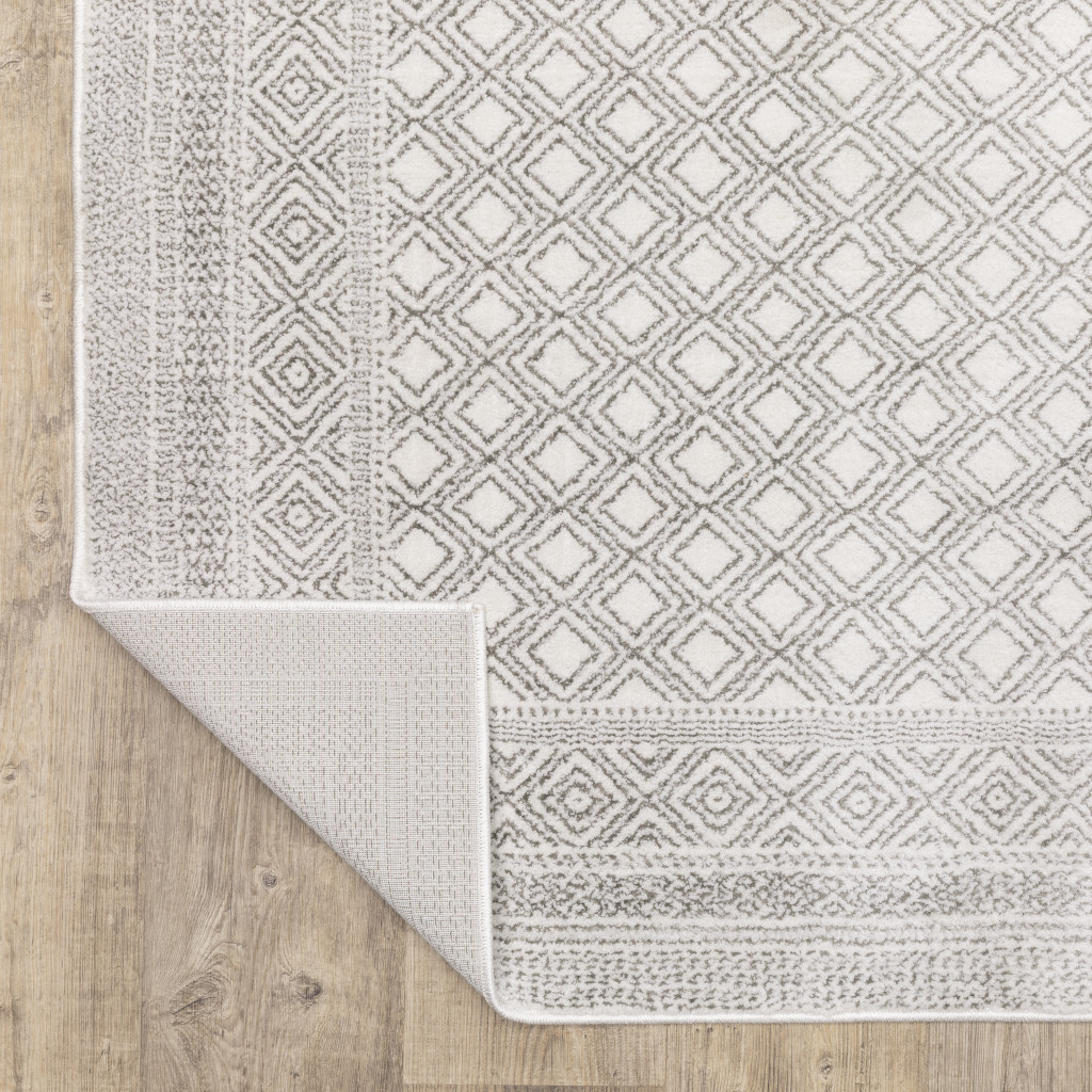 3" X 5" White And Grey Oriental Power Loom Stain Resistant Area Rug