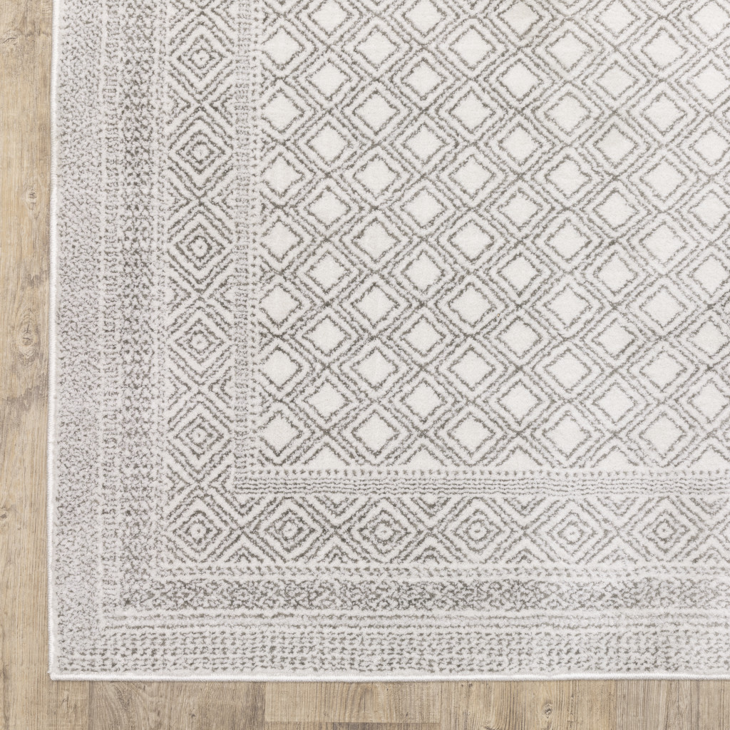 3" X 5" White And Grey Oriental Power Loom Stain Resistant Area Rug