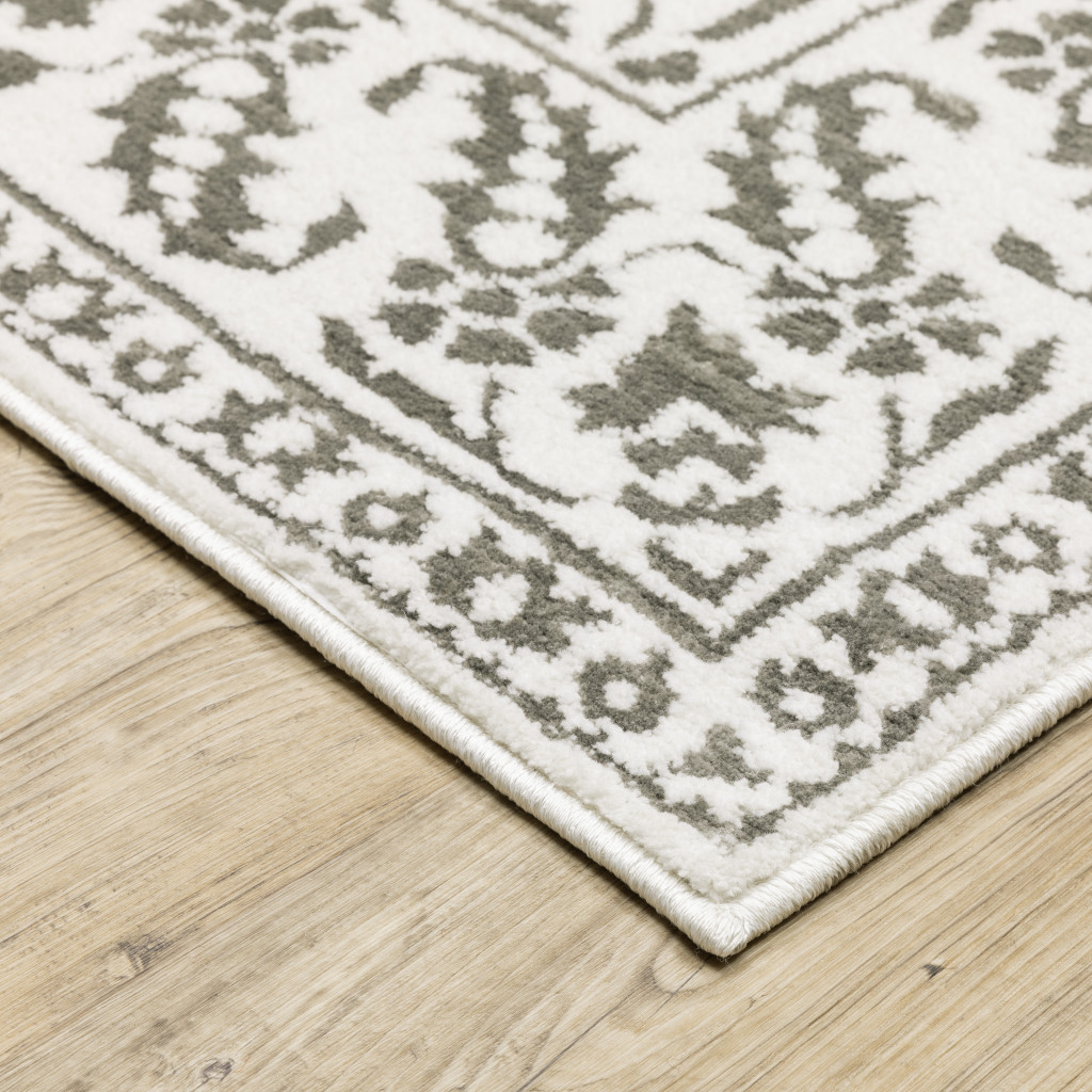 2" X 8" Grey And White Floral Power Loom Stain Resistant Runner Rug
