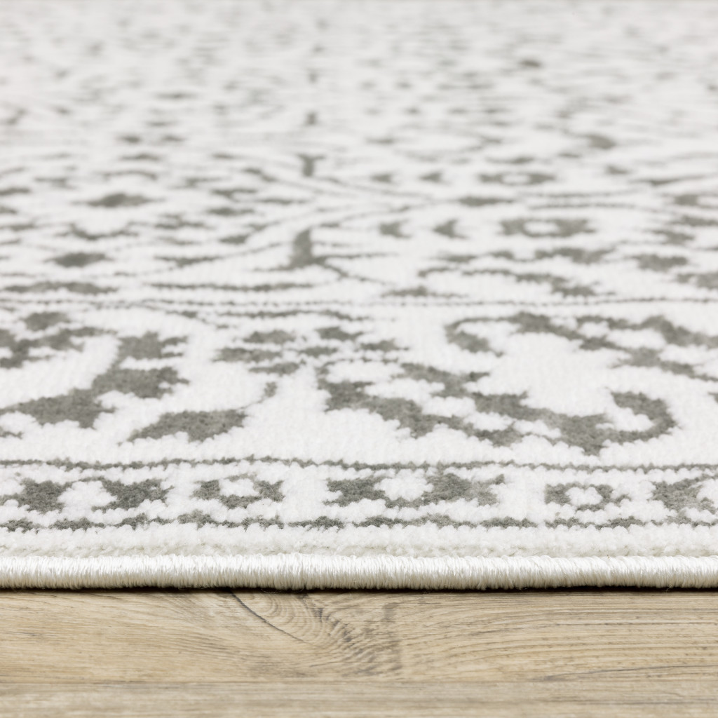 2" X 8" Grey And White Floral Power Loom Stain Resistant Runner Rug