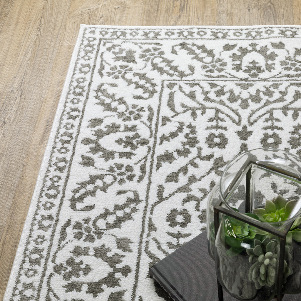 2" X 8" Grey And White Floral Power Loom Stain Resistant Runner Rug