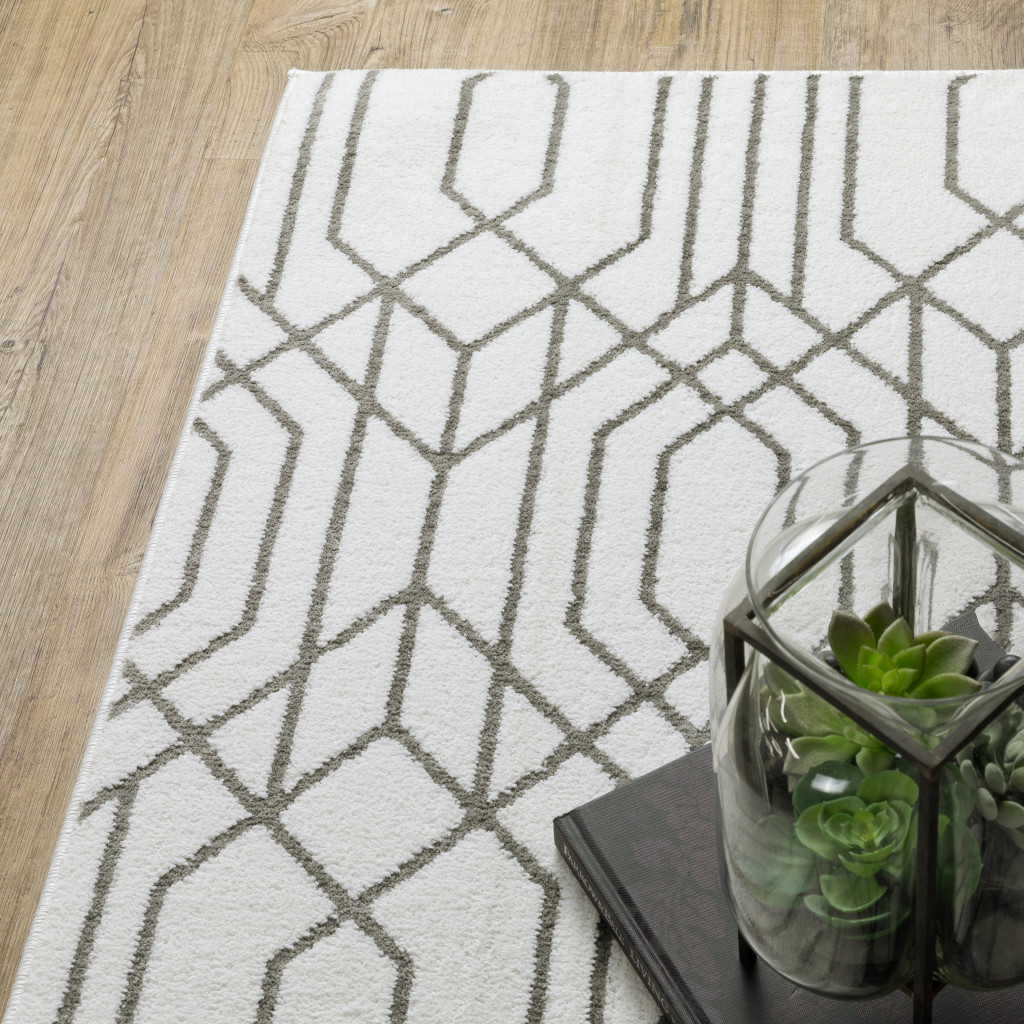 2" X 8" White And Grey Geometric Power Loom Stain Resistant Runner Rug