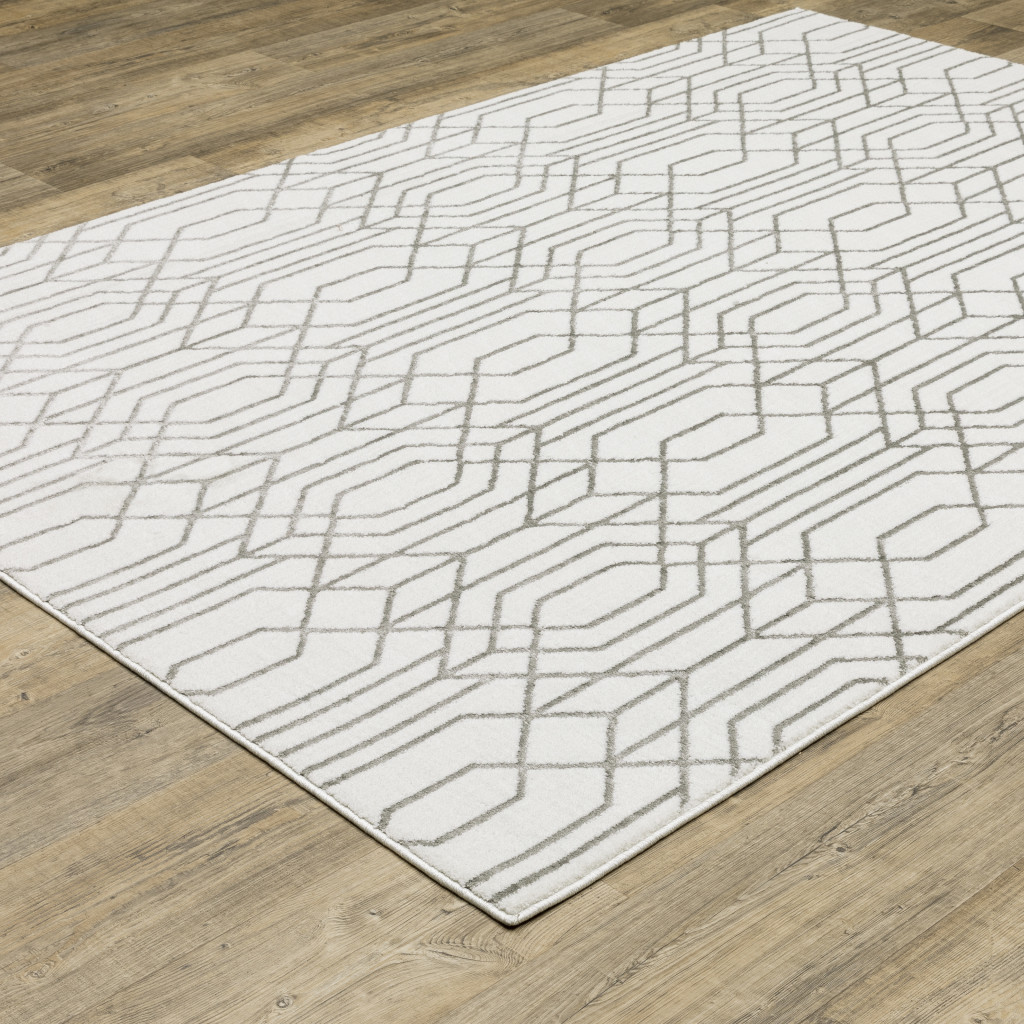 3" X 5" White And Grey Geometric Power Loom Stain Resistant Area Rug