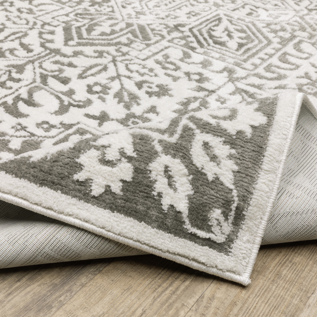 2" X 8" Grey And White Oriental Power Loom Stain Resistant Runner Rug