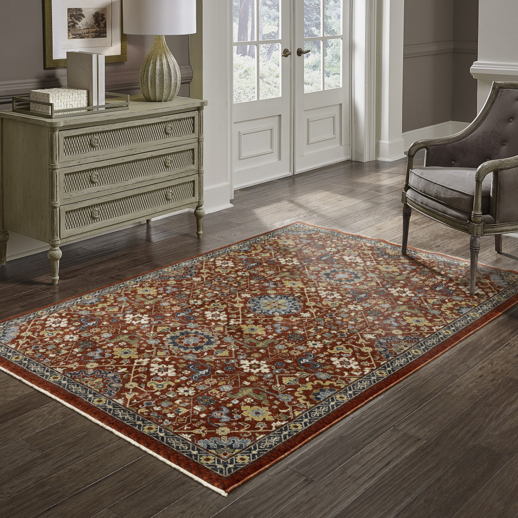 3" X 5" Red Blue Gold And Ivory Oriental Power Loom Stain Resistant Area Rug With Fringe