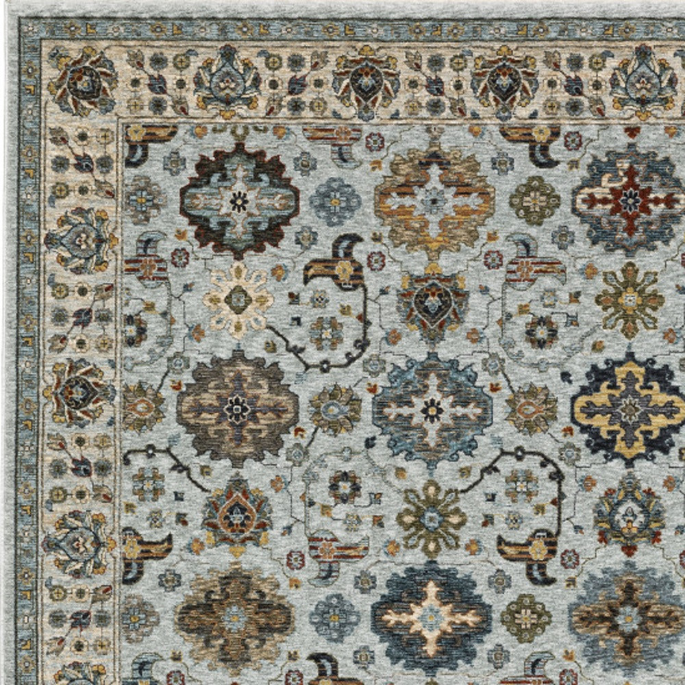 3" X 5" Blue Beige Grey Green Yellow And Rust Oriental Power Loom Stain Resistant Area Rug With Fringe