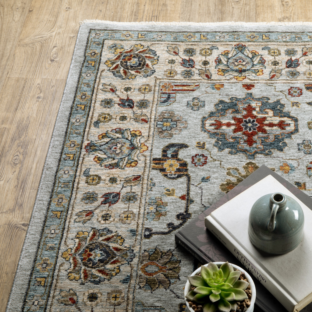 8" X 11" Blue and Beige Oriental Power Loom Area Rug With Fringe