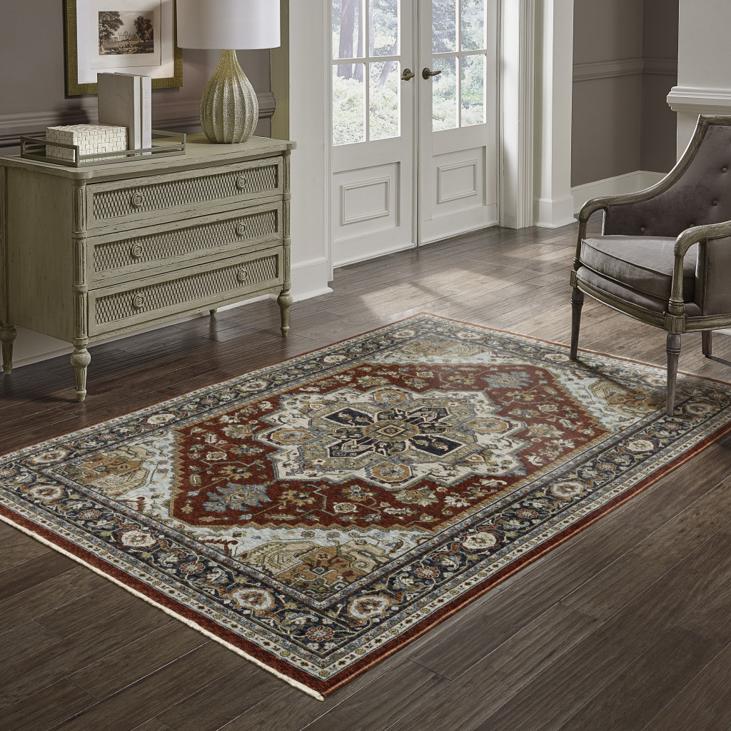 2" X 3" Blue Beige Grey Gold Green And Rust Red Oriental Power Loom Stain Resistant Area Rug With Fringe