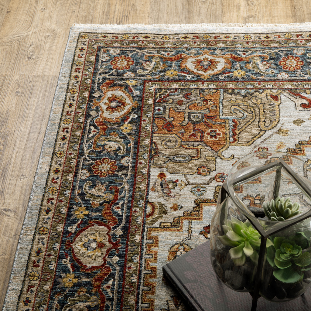 2" X 8" Ivory Beige Blue Orange Gold Green Grey And Rust Oriental Power Loom Stain Resistant Runner Rug With Fringe