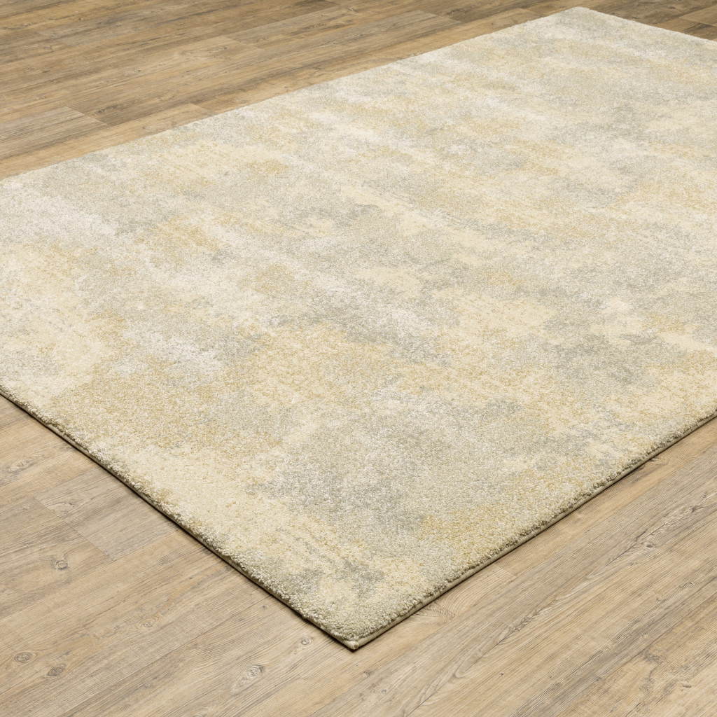 6" X 9" Grey Ivory Beige And Taupe Abstract Power Loom Stain Resistant Area Rug