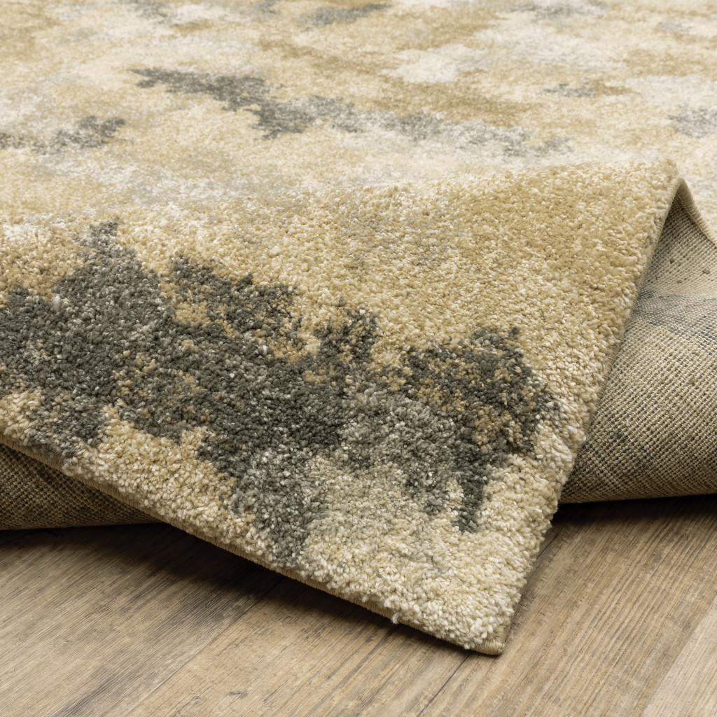 2" X 8" Beige Grey And Gold Abstract Power Loom Stain Resistant Runner Rug