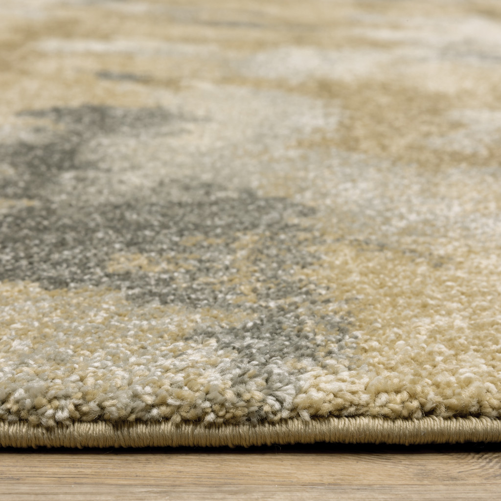 5" X 8" Beige Grey And Gold Abstract Power Loom Stain Resistant Area Rug