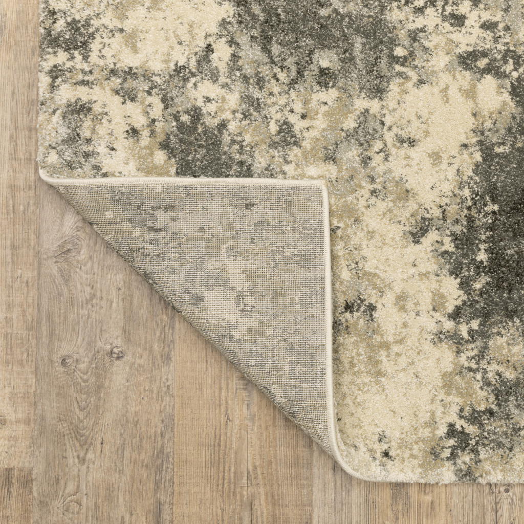 10" X 13" Charcoal Grey Beige And Tan Abstract Power Loom Stain Resistant Area Rug