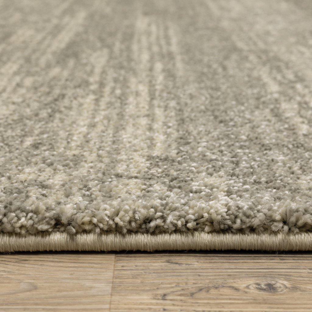 3" X 5" Grey Beige And Tan Abstract Power Loom Stain Resistant Area Rug