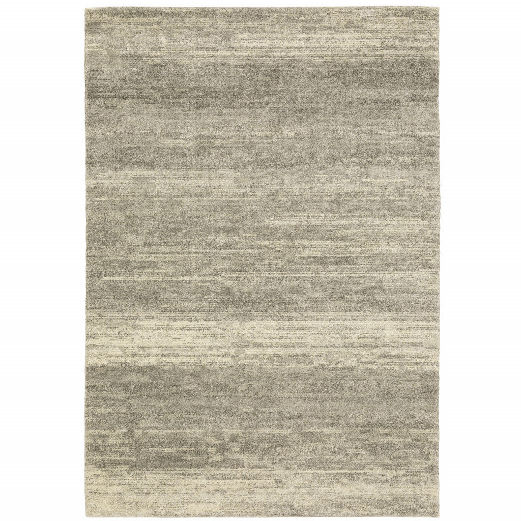 6" X 9" Grey Beige And Tan Abstract Power Loom Stain Resistant Area Rug