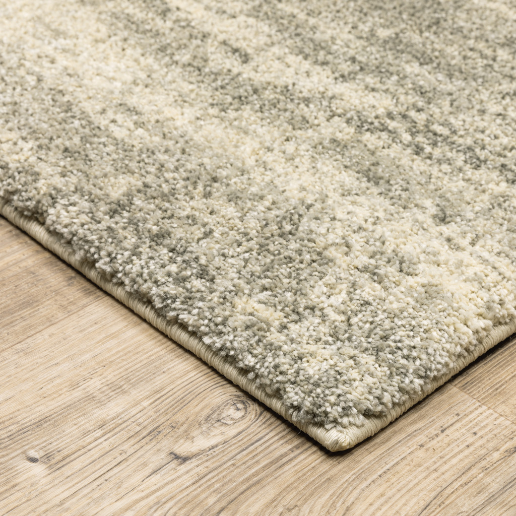 6" X 9" Grey Beige And Tan Abstract Power Loom Stain Resistant Area Rug