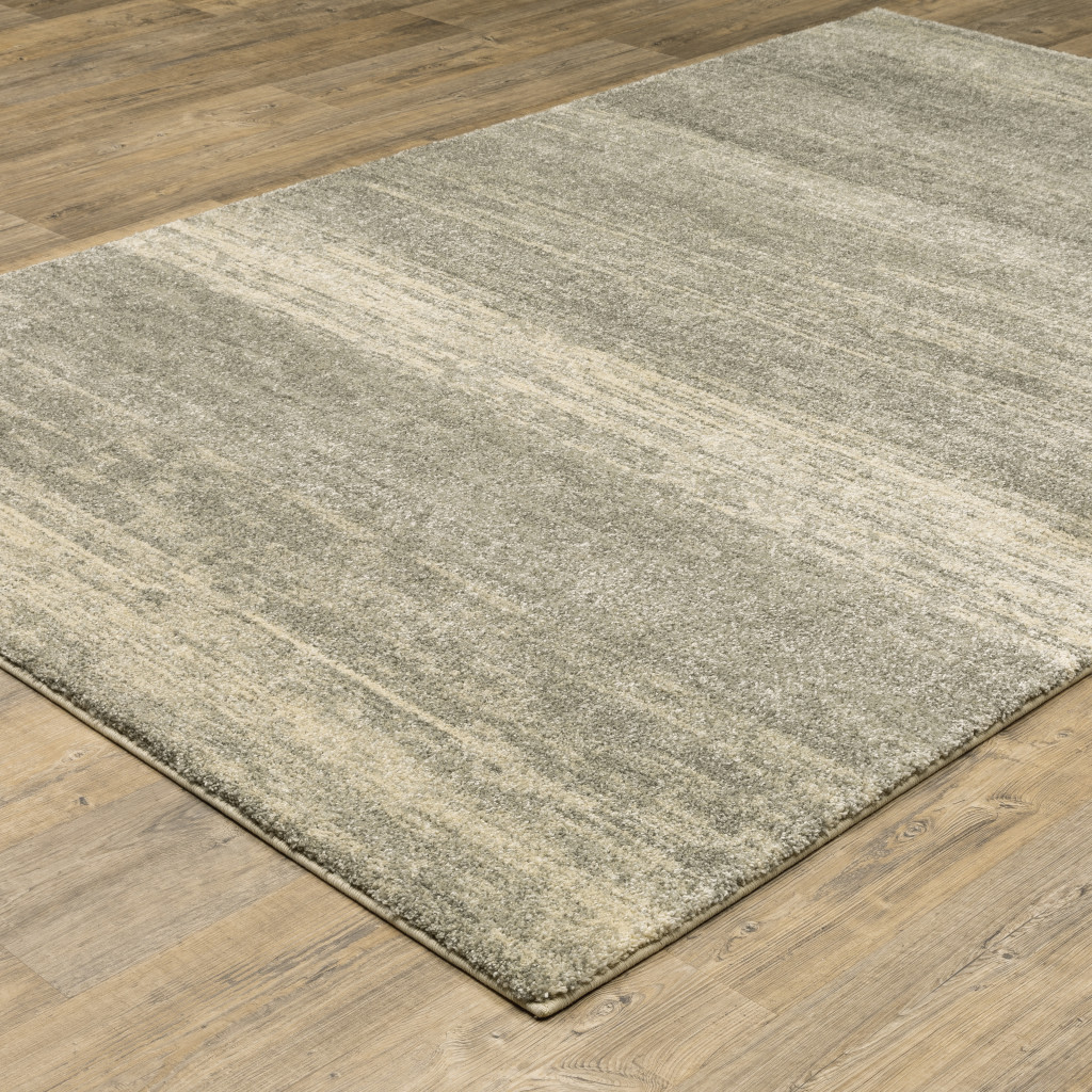 6" X 9" Grey Beige And Tan Abstract Power Loom Stain Resistant Area Rug
