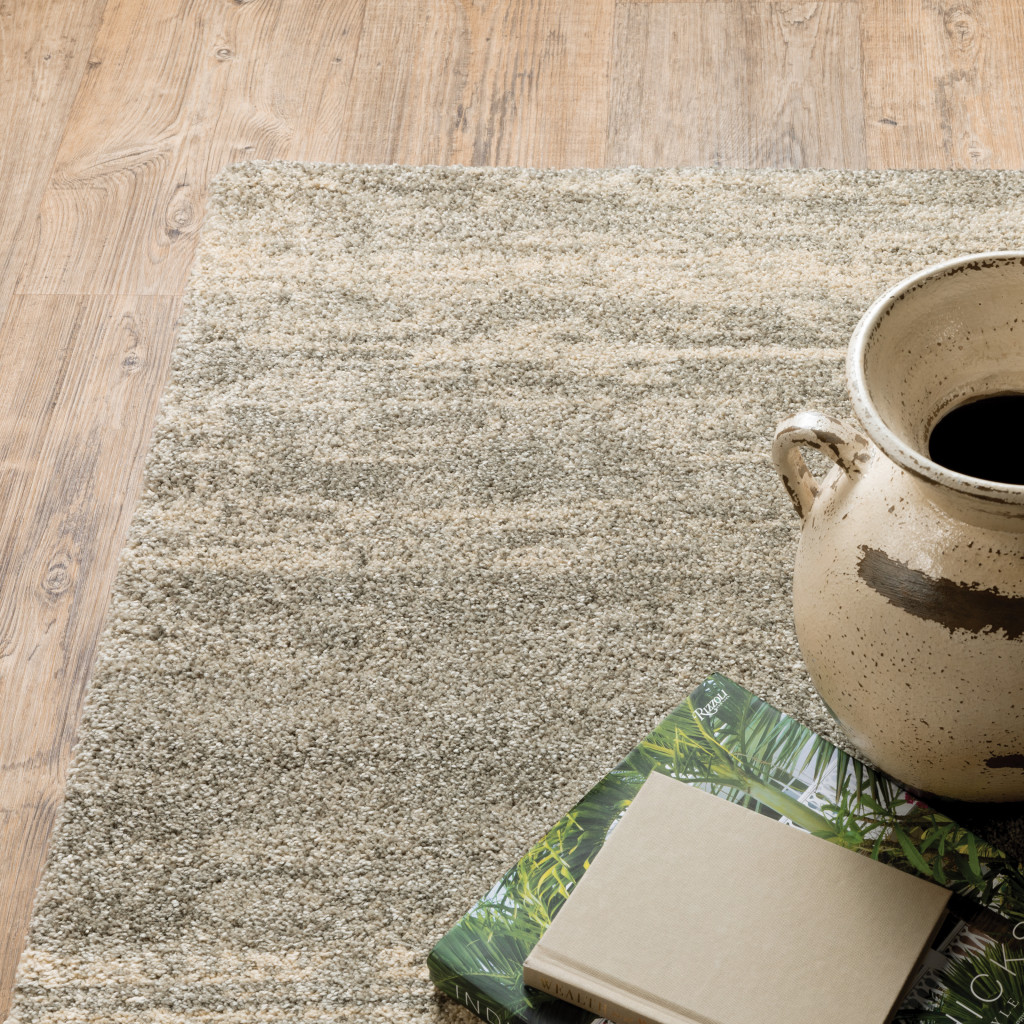 6" X 9" Grey Beige And Tan Abstract Power Loom Stain Resistant Area Rug