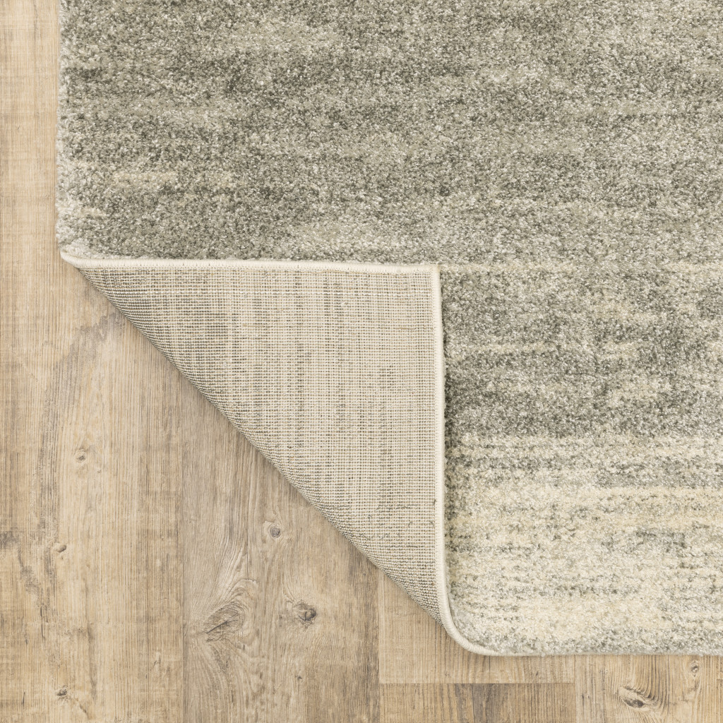 6" X 9" Grey Beige And Tan Abstract Power Loom Stain Resistant Area Rug