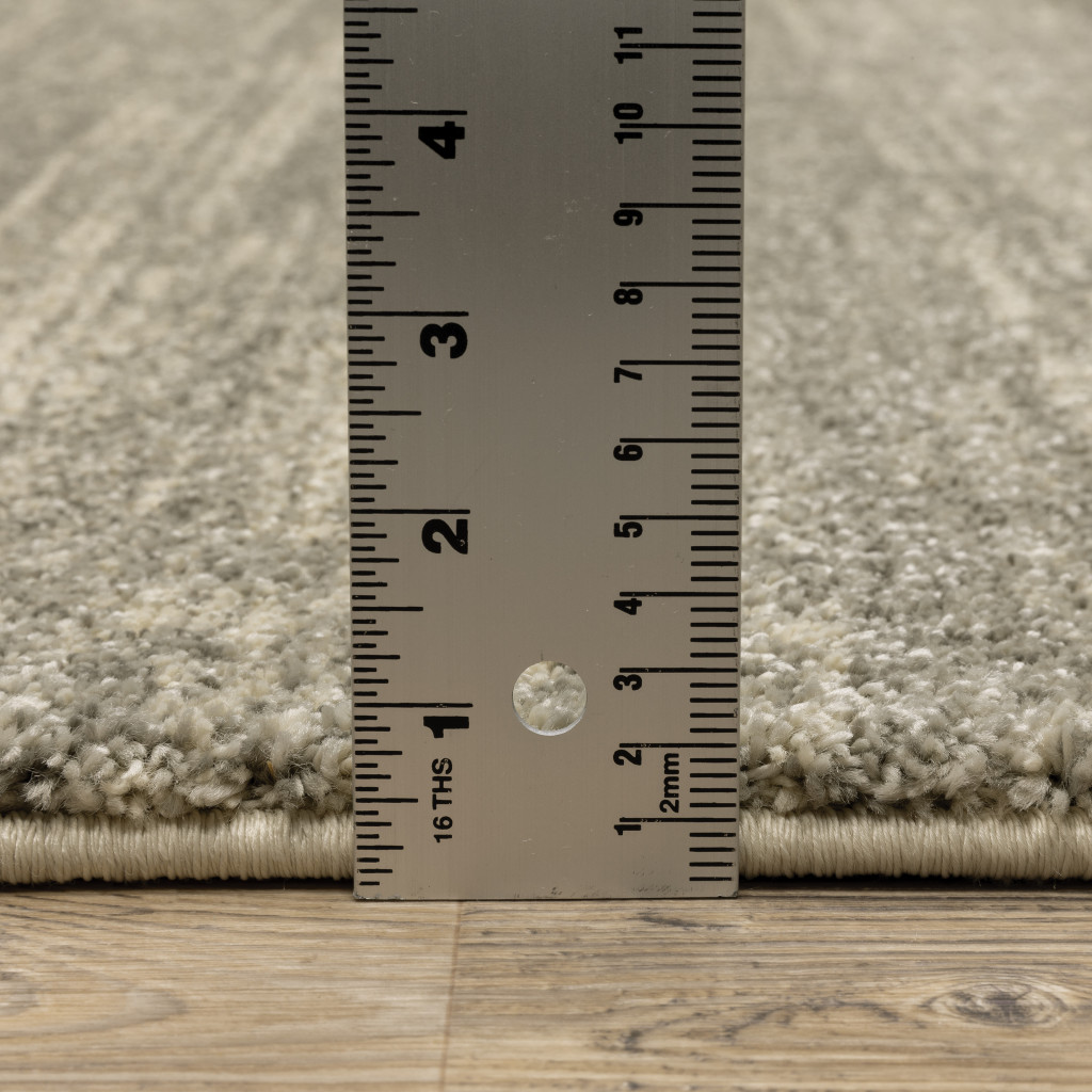 6" X 9" Grey Beige And Tan Abstract Power Loom Stain Resistant Area Rug