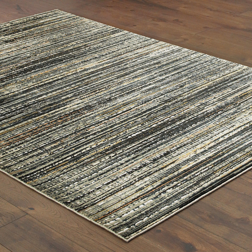 5" X 8" Black Navy Gold Ivory And Blush Abstract Power Loom Stain Resistant Area Rug