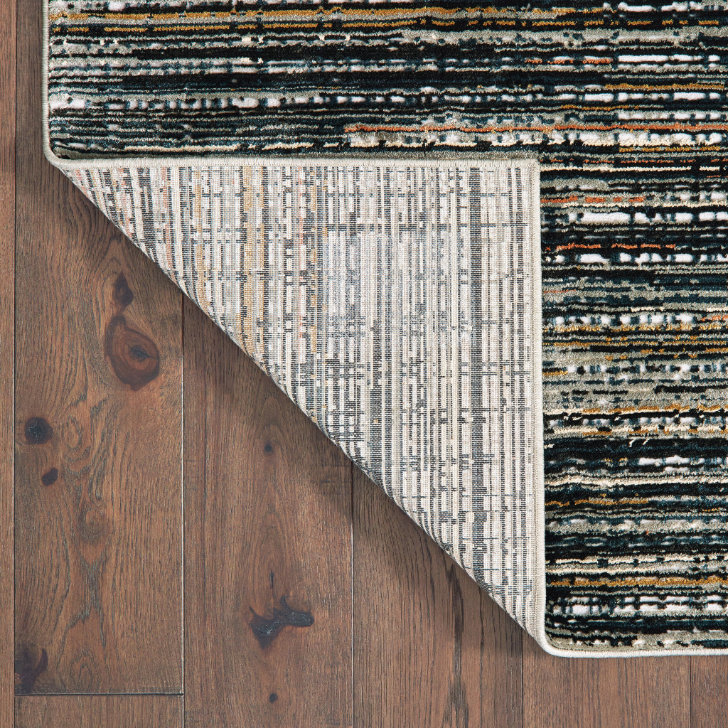 5" X 8" Black Navy Gold Ivory And Blush Abstract Power Loom Stain Resistant Area Rug