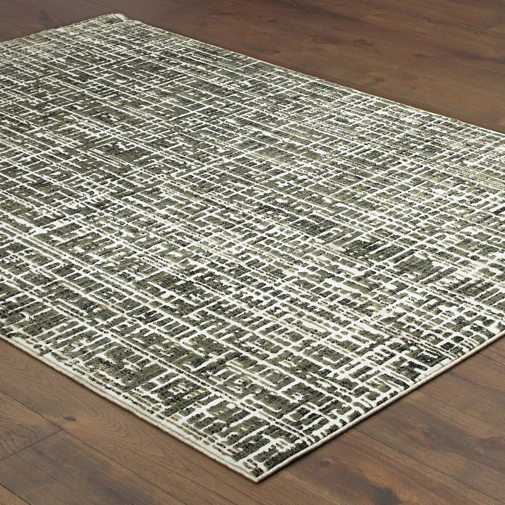 5" X 8" Grey And Ivory Abstract Power Loom Stain Resistant Area Rug