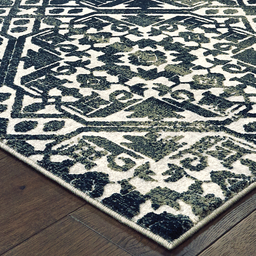 5 X 8 Navy And Ivory geometric Power Loom Stain Resistant Area Rug