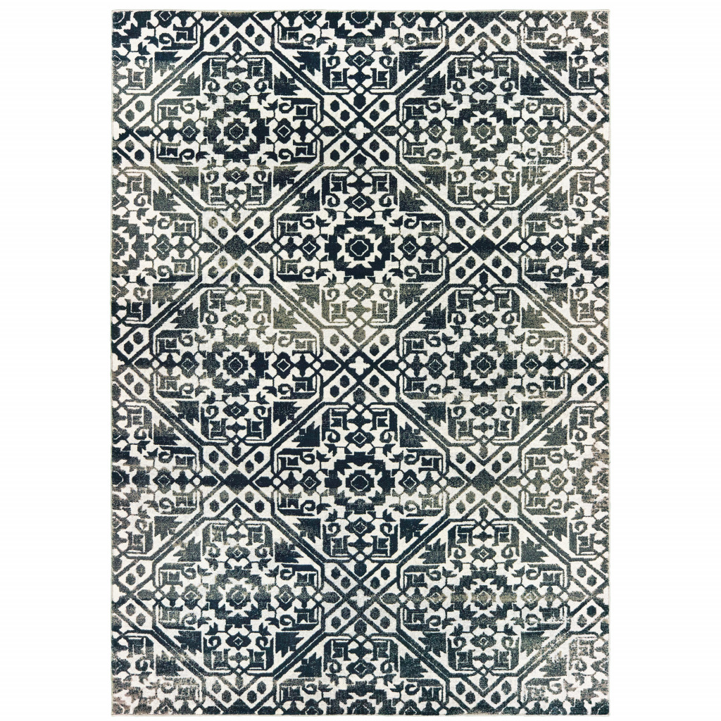8" X 11" Navy And Ivory Geometric Power Loom Stain Resistant Area Rug