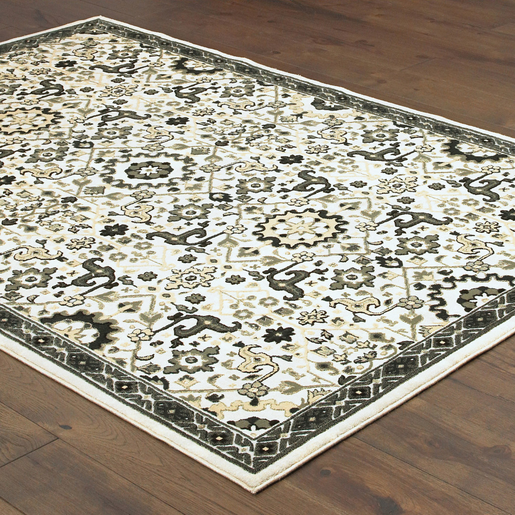8" X 11" Ivory Navy And Gold Oriental Power Loom Stain Resistant Area Rug