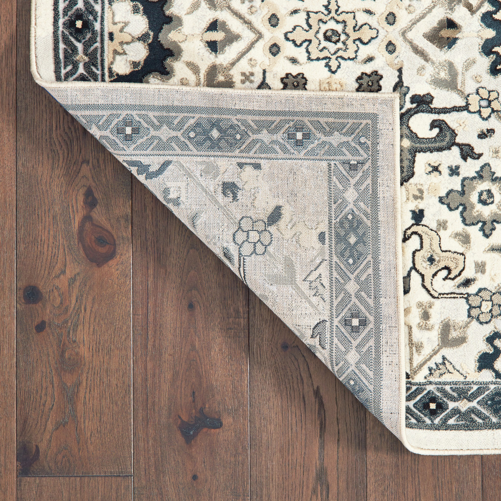 8" X 11" Ivory Navy And Gold Oriental Power Loom Stain Resistant Area Rug
