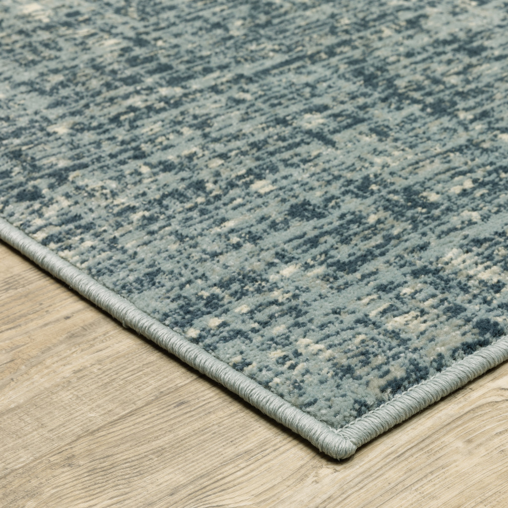 5" X 7" Dark Blue Light Blue Grey Ivory And Beige Abstract Power Loom Stain Resistant Area Rug