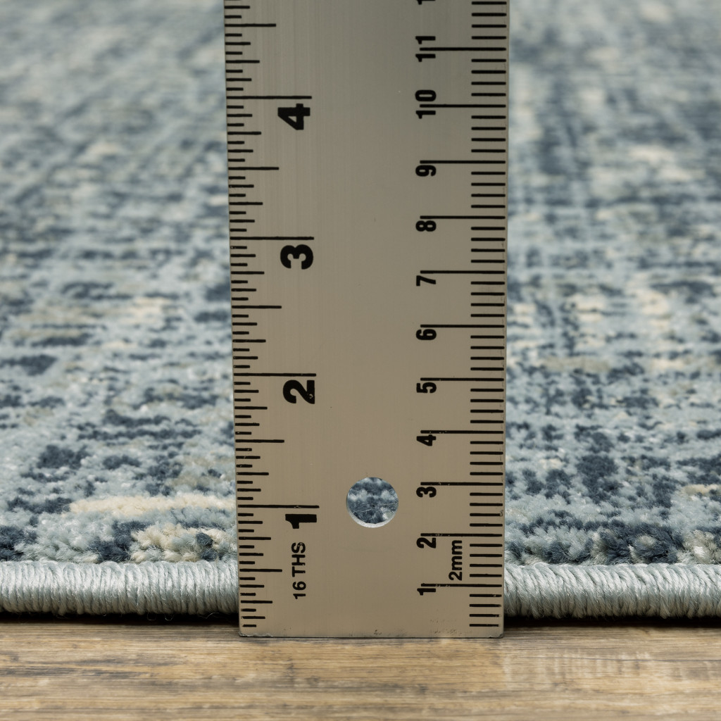 5" X 7" Dark Blue Light Blue Grey Ivory And Beige Abstract Power Loom Stain Resistant Area Rug