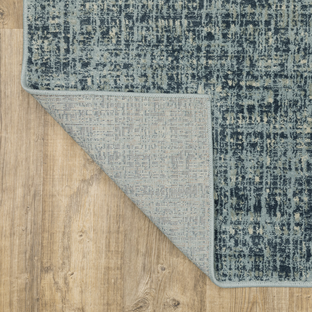 5" X 7" Dark Blue Light Blue Grey Ivory And Beige Abstract Power Loom Stain Resistant Area Rug