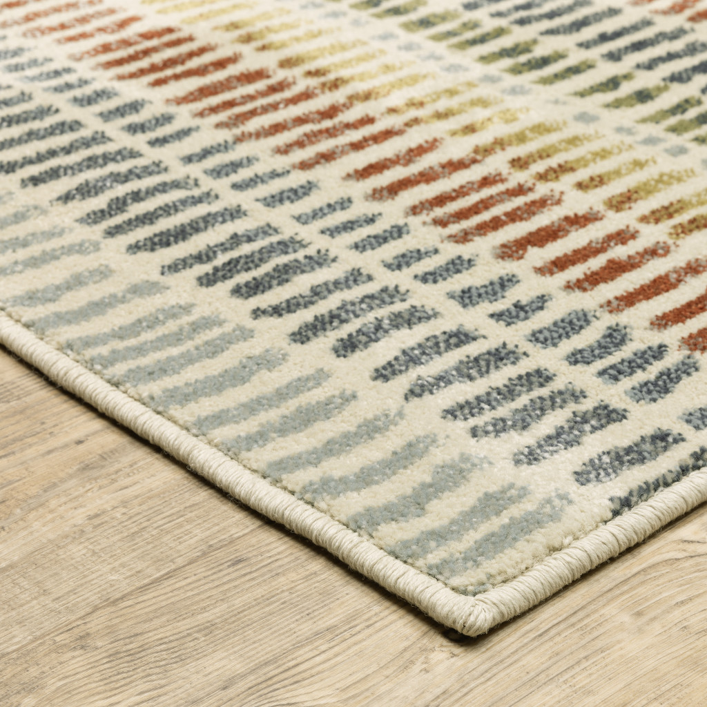 3" X 5" Ivory Blue Green Red And Gold Geometric Power Loom Stain Resistant Area Rug