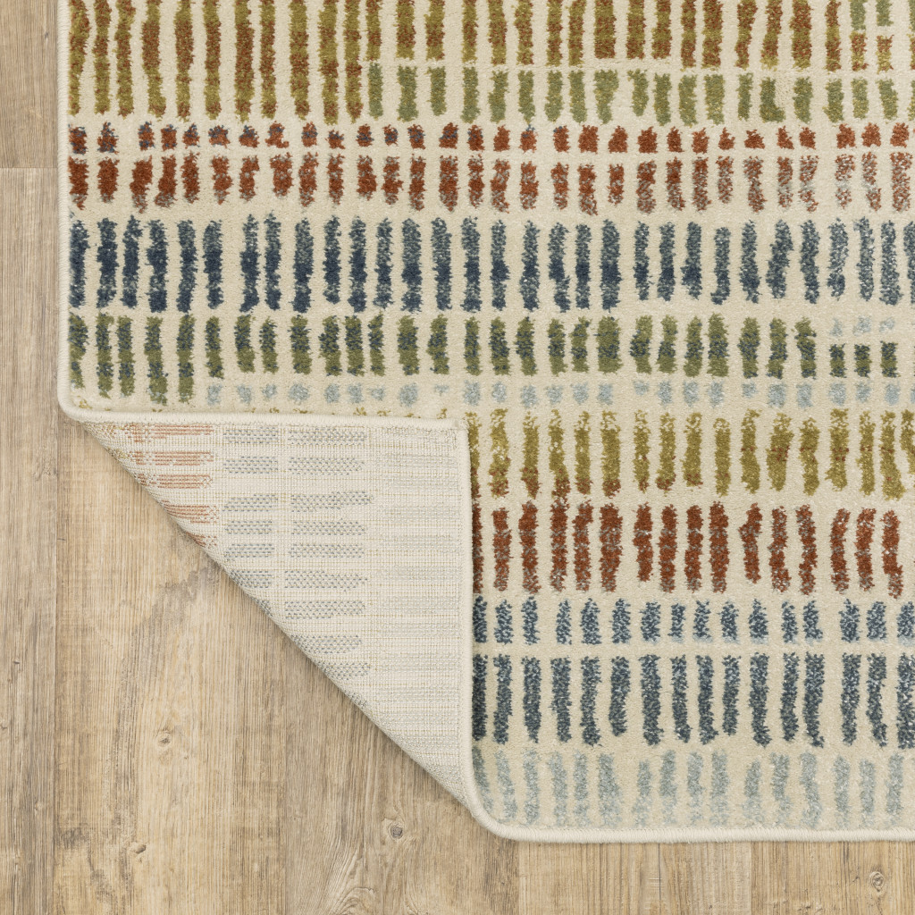 3" X 5" Ivory Blue Green Red And Gold Geometric Power Loom Stain Resistant Area Rug
