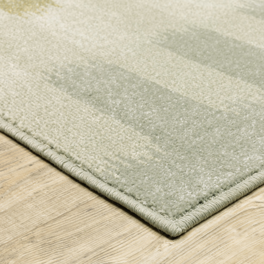 3 X 5 Beige grey gold And green geometric Power Loom Stain Resistant Area Rug